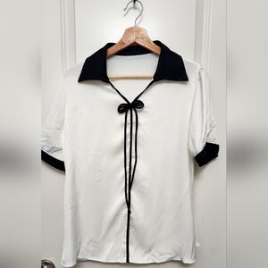 White Blouse with Black Accents